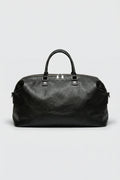 Top-grain luxury black leather executive duffle bag for business travel and gym use.