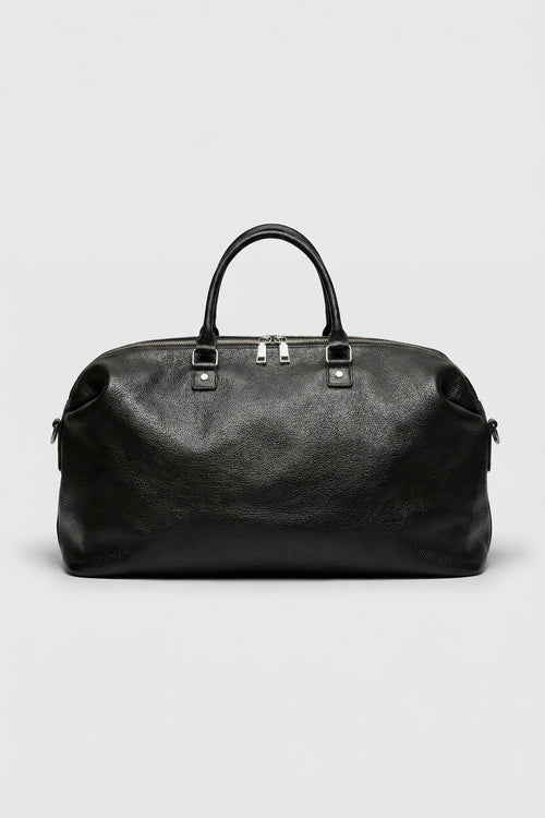 Top-grain luxury black leather executive duffle bag for business travel and gym use.