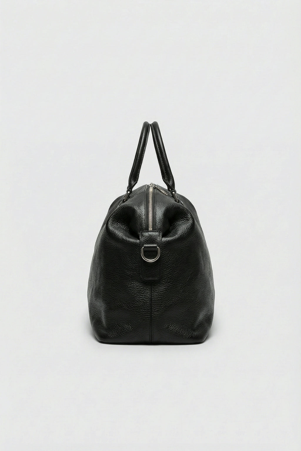 Durable top-grain leather travel bag with premium hardware.